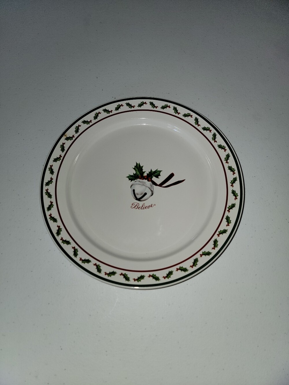 The Polar Express 'Believe' Holly Bell Ceramic Dinner Plate - White/Green